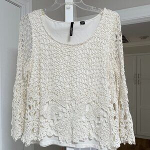Skye's the Limit Knit Lacy Top with Stretchy Lining.